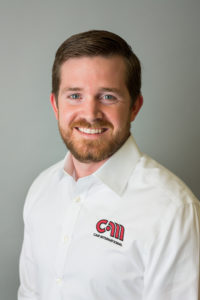 photograph of chad in a cam international uniform