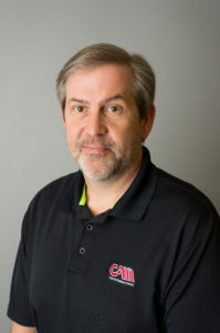 photograph of kris in a cam international uniform