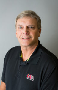 photograph of mark in a cam international uniform